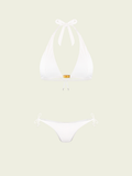 White bikini set on a light beige background