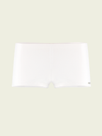White rectangular object on a light beige background