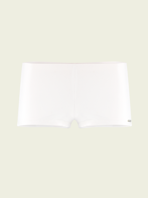 White rectangular object on a light beige background